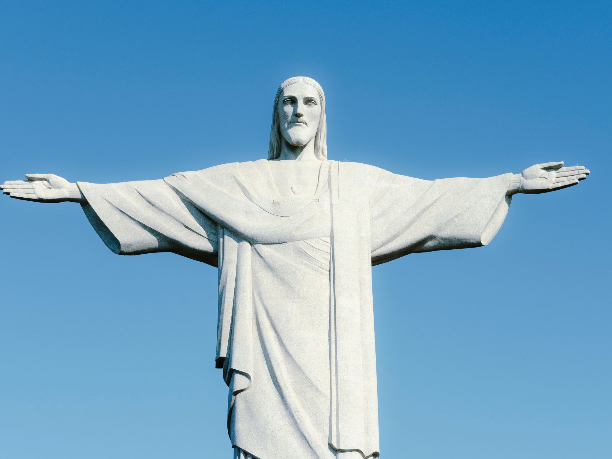 Kristusstatuen Cristo Redentor på toppen af Corcovado-bjerget. Foto Viktors Farmor